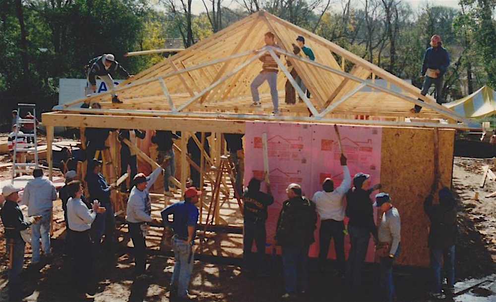 A picture of one of the first homes built by NW metro Atlanta Habitat for Humanity during exterior framing.